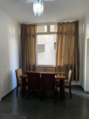 Apartamento na praia com estacionamento Pé na areia Guarujá